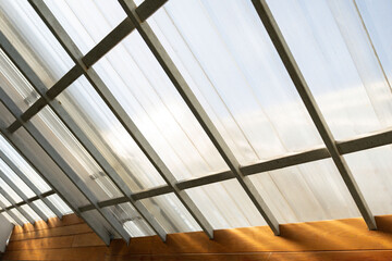 A clear blue sky with a few clouds scattered throughout