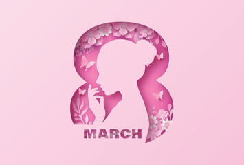 March 8 woman profile with floral decoration, paper cut silhouette