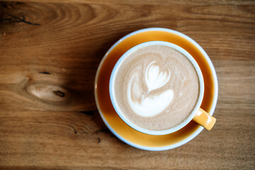 Coffee latte art. Morning Cup of cappuccino in a cafe for breakfast