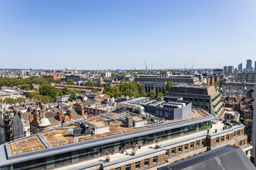 Fototapeta premium London Skyline from Above. Urban Landscape Featuring Historic Rooftops and Landmarks