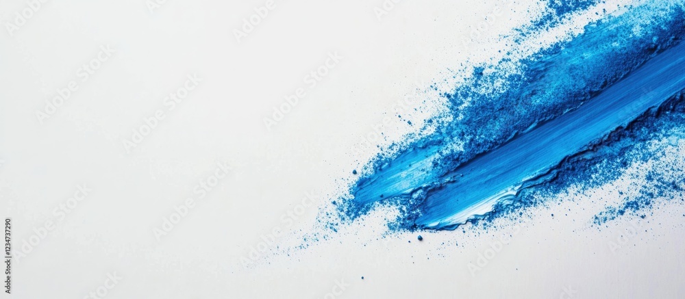 Poster blue paint splash on white background with textured application and copy space for text placement