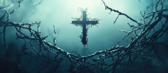 Mysterious dark forest scene with crucifix surrounded by twisted branches and fog Copy Space