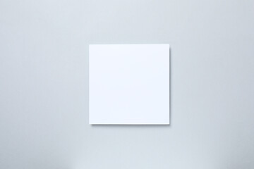 White paper card on gray background
