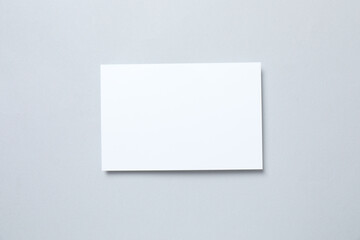 White paper card on gray background