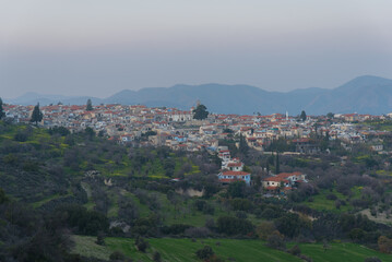 A picturesque view of Lefkara village in Cyprus, famous for its traditional stone houses, narrow streets, and rich lace-making heritage, nestled in a scenic mountain landscape.