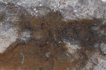 Granite stone with black stains
