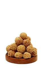 Mini onde onde sprinkled with sesame on top, this snack tastes sweet with a crunchy texture. Isolated on white background 