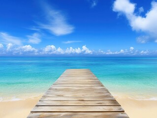 Fototapeta premium A tranquil wooden pier extends over crystal-clear turquoise waters, inviting relaxation and reflection under a bright blue sky dotted with fluffy white clouds.