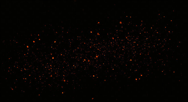 Orange particles on black background