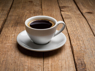 Fototapeta premium a cup of black coffee on the table