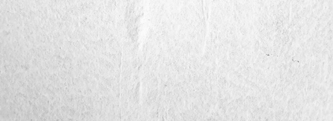 White old concrete wall grunge texture - wide banner format background with copy space for text. Grunge gray texture of chips, cracks, scratches. Soft white grunge. Distressed black grunge texture.
