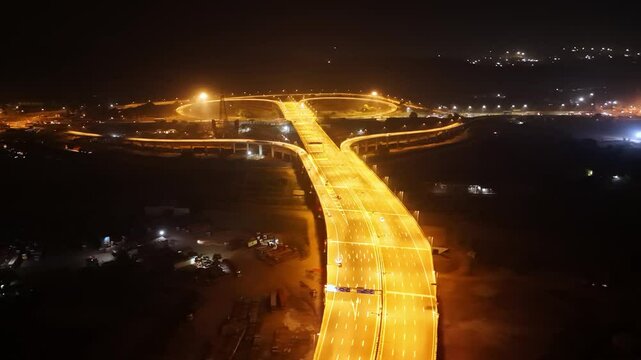 Night aerial of radiant highways and connectors