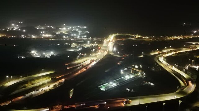 Aerial Night View of Roadway Interchange