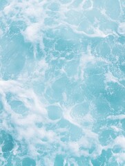 Obraz premium Ocean water with white foam and bubbles, a serene and calming image.