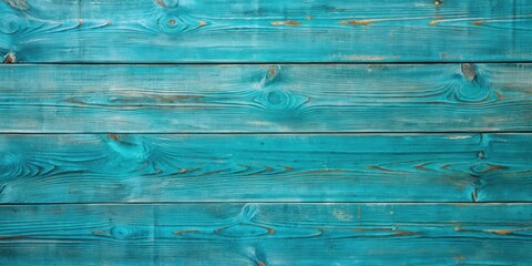 Fototapeta premium A close-up of weathered teal blue wooden planks with natural grain patterns and faded paint