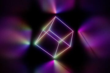 Fototapeta premium A cube with neon lights is lit up in a dark room