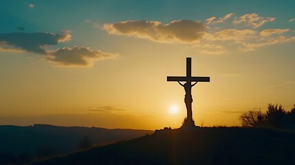 A lonely Christ on a mountain at dawn. Holy Week concept.