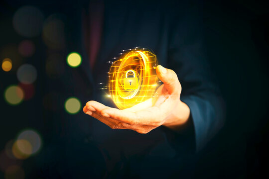 Businessman holding virtual yellow gold plus sign for positive thinking mindset or healthcare insurance concept