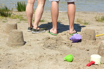 A Wonderful and Fun Day at the Beach Building Sandcastles Together with Loved Ones