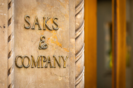 New York City, USA - 4 November 2022: Logo of Saks & Company on the Storefront on 5th Avenue, Close-up, Copy Space