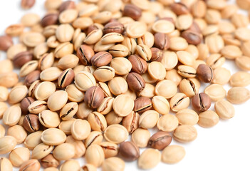Heap of sunflower seeds and kernel close-up on white background. Isolated
