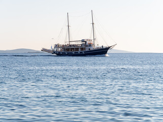 A sunset cruise ship tour on the island of Mykonos in Greece