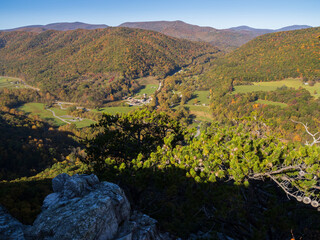 View from summit of Seneca Rocks, West Virginia, of mountain sides in fall colors on sunny morning