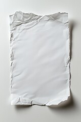 Obraz premium Blank sheet of crumpled white paper on a smooth surface.