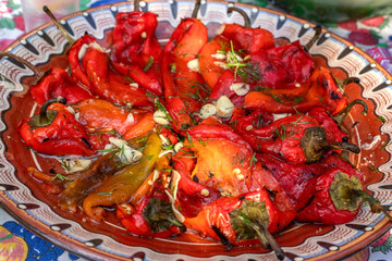 plate of salad of roasted red peppers and garlic