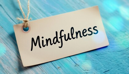 Mindfulness tag on blue wood background promoting calm and thoughtful reflection