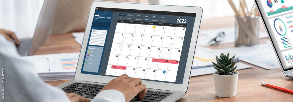 Poster calendar on computer software application for brisk schedule planning for personal organizer and onl