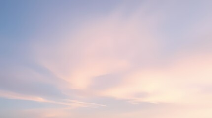 Obraz premium Soft pastel clouds create a tranquil sky at dusk over a peaceful landscape during early evening hours. Generative AI