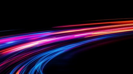 Abstract light trails with vibrant colors and neon glow on black background