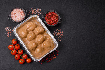 Meatballs with salt and spices in creamy caramel sauce