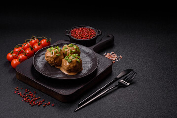 Meatballs with salt and spices in creamy caramel sauce