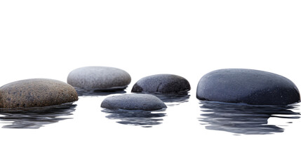 Smooth pebbles floating on transparent water surface background