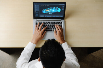 Electric car design software on computer screen showing simulation blueprint snugly by digital calculating application for manufacturing preparation
