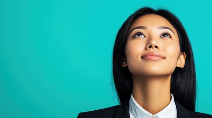 Young Woman Looking Upward Hopeful and Confident