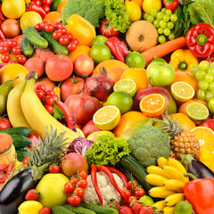 Large background of fresh berries, vegetables and fruits. Food concept.