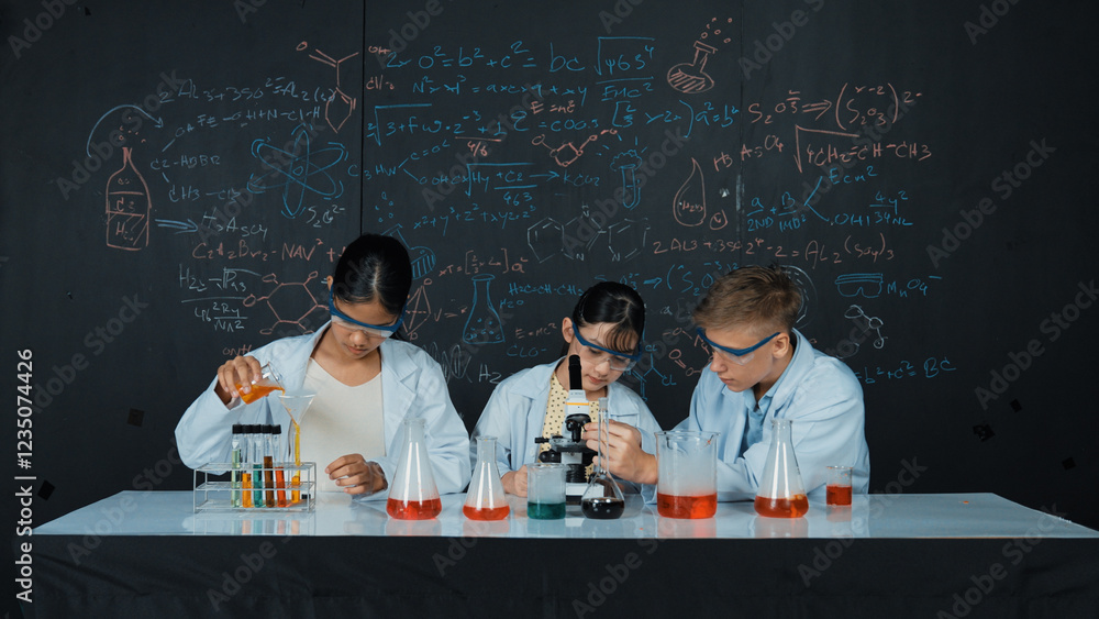 Poster cute girl looking under microscope while student doing experiment at blackboard with theory written.
