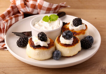 Traditional Ukrainian cottage cheese and raisin fritters