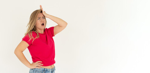 Gosh why me. Portrait of unhappy displeased and annoyed young woman in red t-shirt facepalming with...