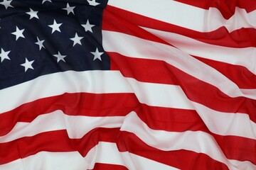 Fototapeta premium Waving American flag in close up. Concept of holidays in USA.