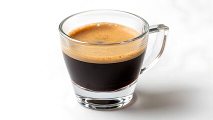 A clean, studio shot of a single serving of espresso in a clear glass cup. The espresso displays a rich, 