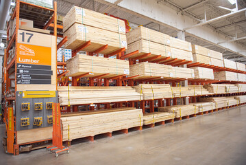 Natural wood, plywood, treated material at lumber yard of large hardware store, Dallas, Texas, full...