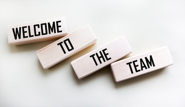 Welcome to the team symbol. Conceptual words Welcome to the wooden block team.