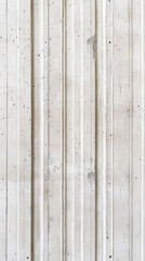 Textured concrete wall close-up with vertical rough streaks for modern design