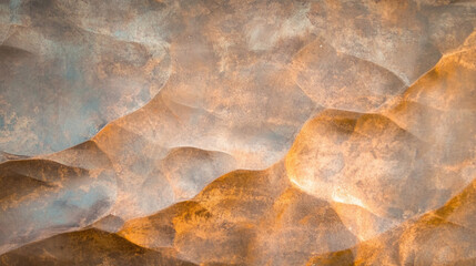 Obraz premium Elegant gold liquid texture background with smooth flowing patterns and tones