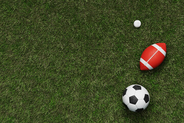 Different balls on green grass.