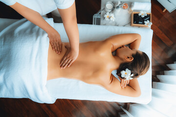 Panorama top view woman customer enjoying relaxing anti-stress spa massage and pampering with...